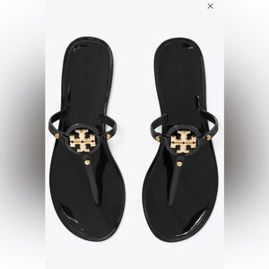 Tory Burch Black and Gold Women's Sandals
Like new!!